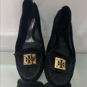 Black loafers with Gold logo